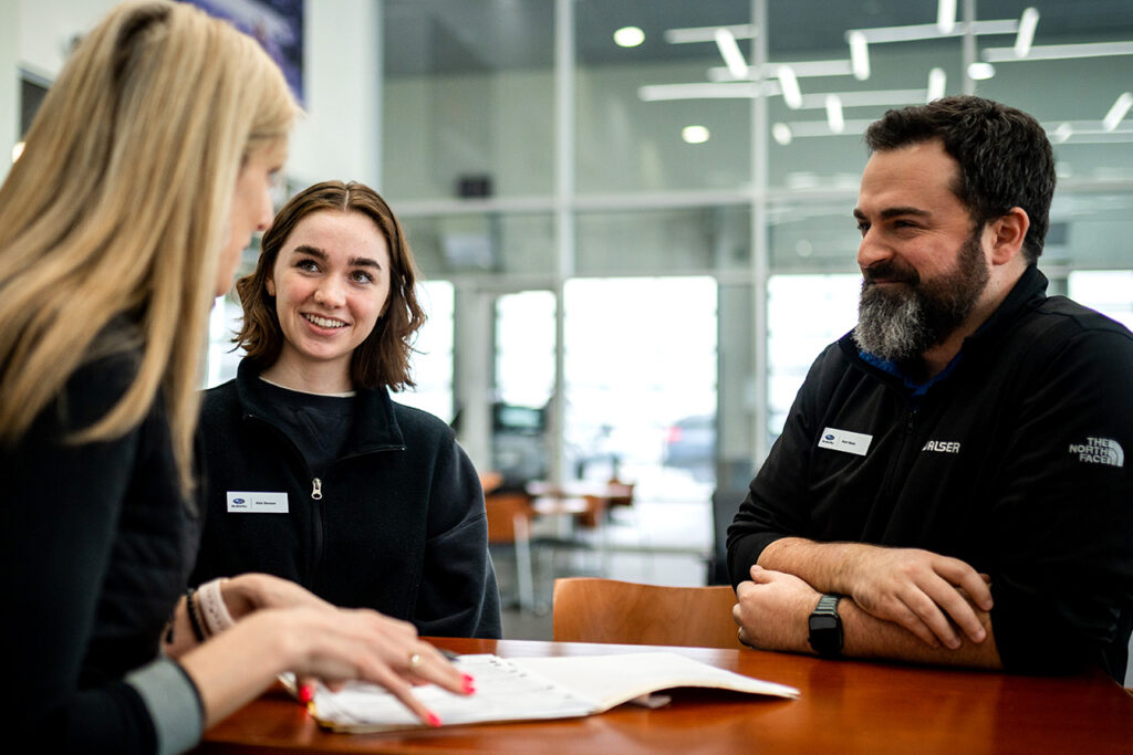A group of Walser Salespeople training at a dealership
